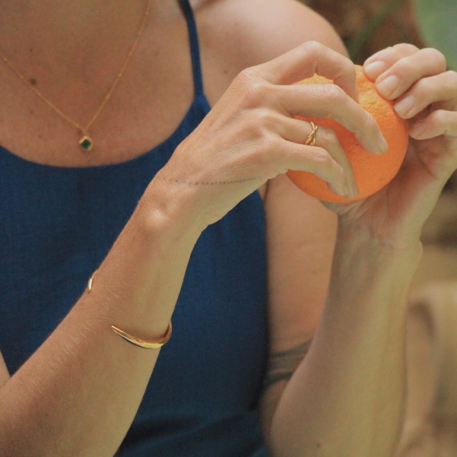 Image is an adjustable 24K gold plated brass cuff, handmade by Izaskun Zabala.