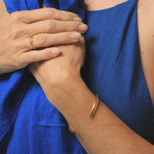 Image is an adjustable 24K gold plated brass cuff, handmade by Izaskun Zabala.