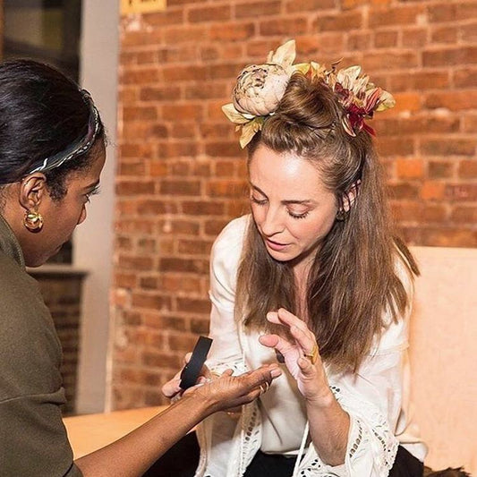Izaskun Zabala during a hand reading session in her palmistry practice.