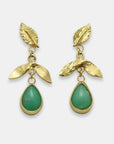 Gold-plated leaf earrings with green teardrop stone, handmade by Izaskun Zabala.