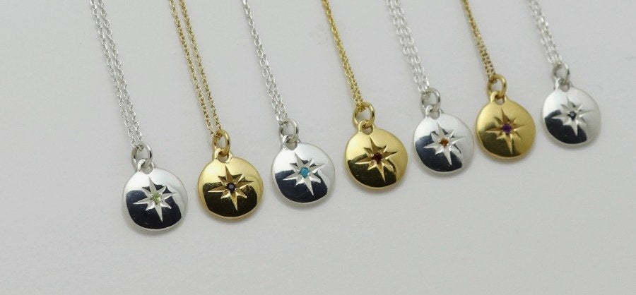 Gold and silver medallions with star engraved stone set necklaces