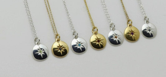 Gold and silver medallions with star engraved stone set necklaces