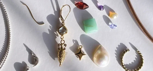 Different metals like silver, copper, brass and gold, with various natural gemstones.