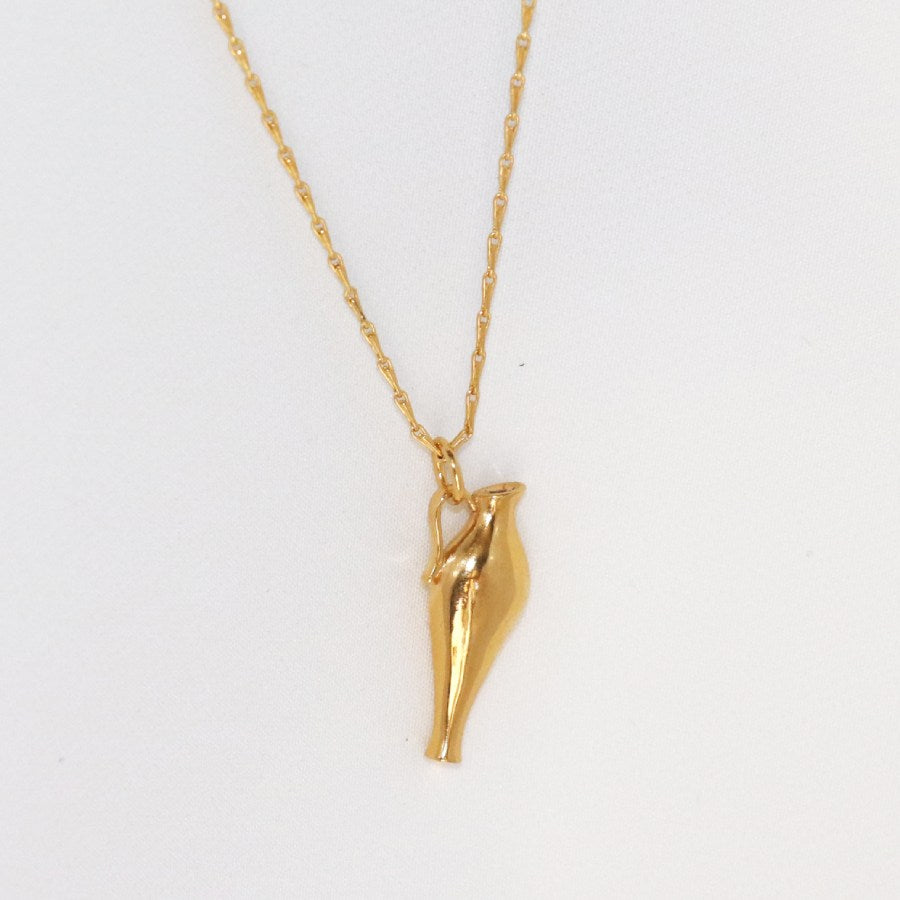 Image is a 24K gold plated necklace with an amphora pendant and fancy chain, handmade by Izaskun Zabala.