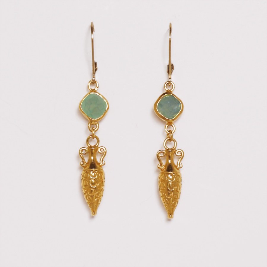 Image is a pair of 24K gold plated earrings with a carved amphora dangling from a cushion cut chalcedony stone, handmade by Izaskun Zabala.