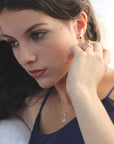 Woman wearing silver jewelry, handmade by Izaskun Zabala.