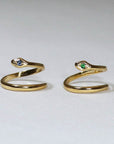 Image is a 24K gold plated minimalist snake ring, handmade by Izaskun Zabala.