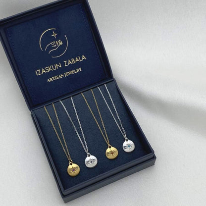 Image is gold-plated and silver birthstone medallion pendant delicate necklaces, displayed in the brand's packaging.