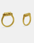 Pair of gold-plated rings with a rotating top cilinder, handmade by Izaskun Zabala.