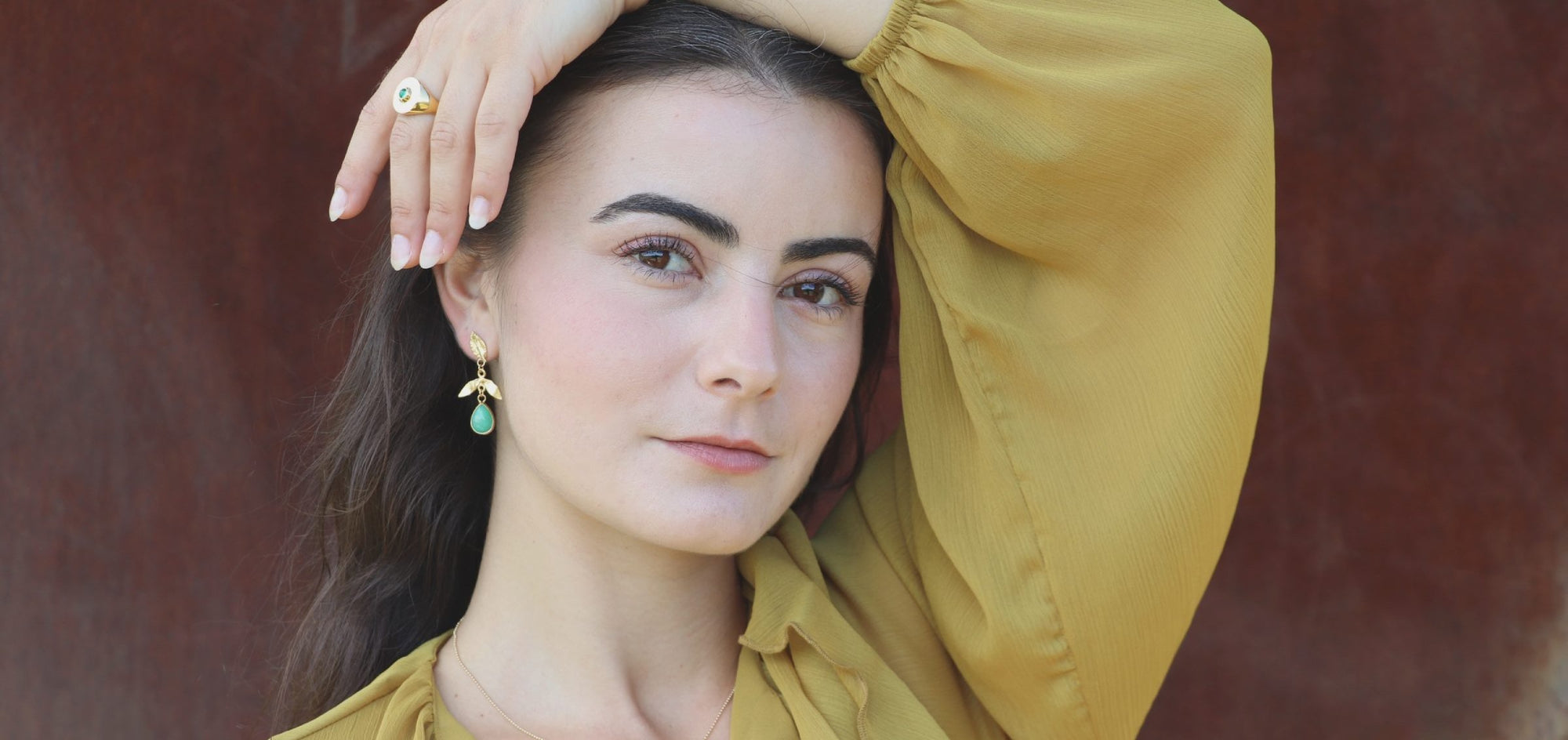 Woman wearing handcrafted jewelry by Izaskun Zabala.