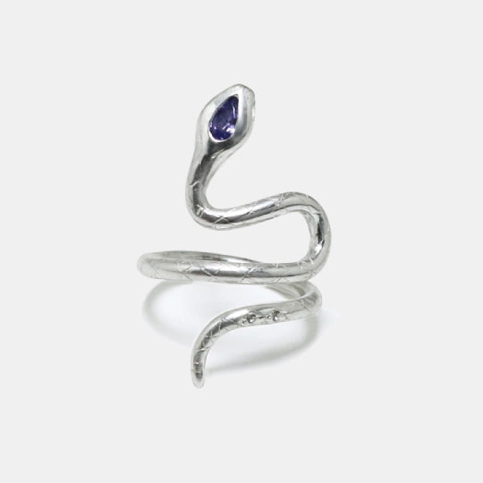 Silver snake ring with a tanzanite pear-shaped and white sapphire stones, artisan made by Izaskun Zabala.