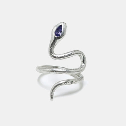 Silver snake ring with a tanzanite pear-shaped and white sapphire stones, artisan made by Izaskun Zabala.
