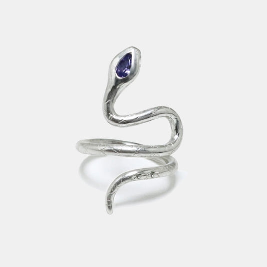 Silver snake ring with a tanzanite pear-shaped and white sapphire stones, artisan made by Izaskun Zabala.