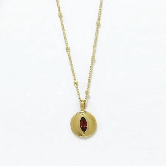 24K gold-plated small disk pendant with garnet marquise delicate necklace, handmade by Izaskun Zabala.