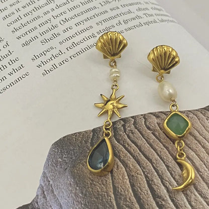 Handcrafted celestial earrings with freshwater pearls and colorful gemstone drops