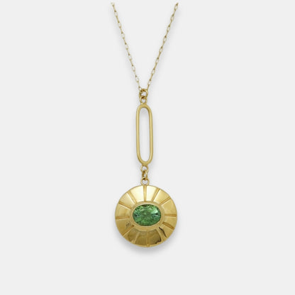 Gold-plated pendulum necklace with a green turmaline pendant, handmade by Izaskun Zabala.