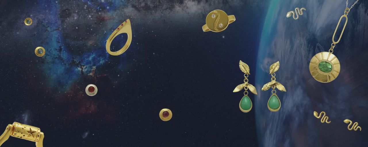 Video collage of space view of the earth with handmade jewelry by Izaskun Zabala.