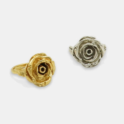 Gold-plated and silver rose-shaped carved rings handmade by Izaskun Zabala.