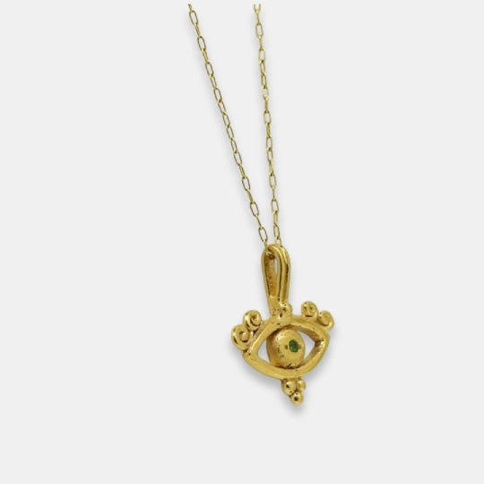 Side view of Solar Gaze Necklace with tsavorite in gold-plated brass