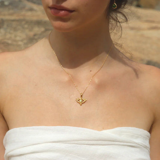 Solar Gaze Necklace with tsavorite in gold-plated brass worn on a model