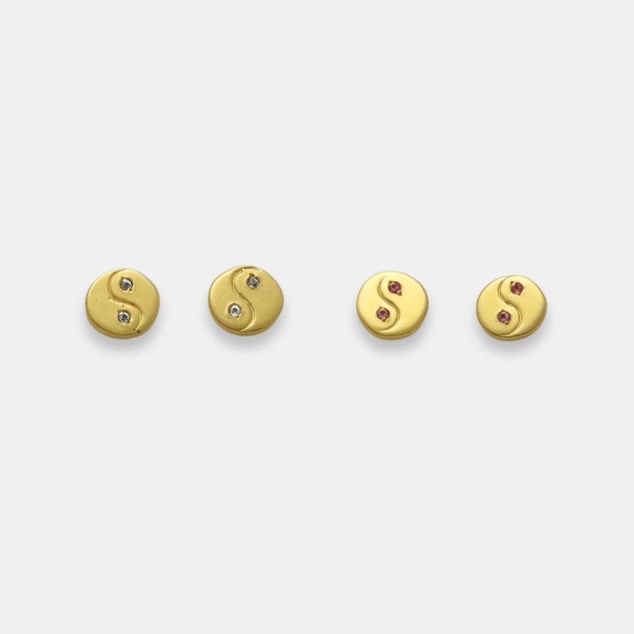 Gold-plated yin yang stud earrings with sapphires, handmade by Izaskun Zabala.