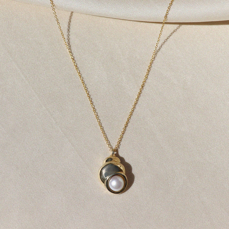 Izaskun Zabala jewelry shell pendant with pearl necklace